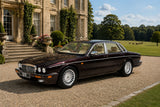 Jaguar XJ12 Sovereign (1994) - regency red 1:18
